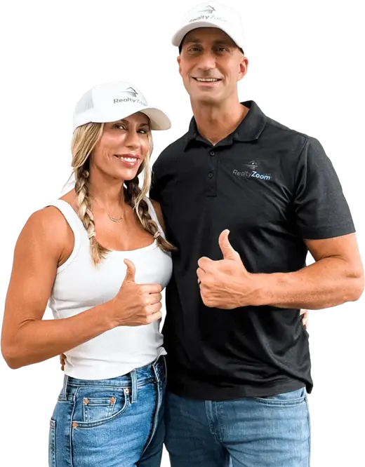 RealtyZoom owners giving a thumbs up, signaling a successful home sale and approved cash offer.